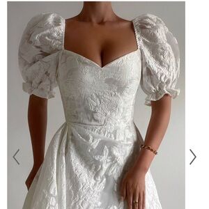 White Puff Sleeve Sweetheart Neckline Wedding Gown